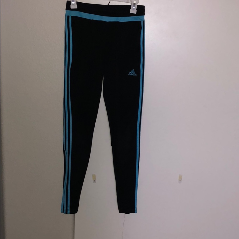 Adidas joggers with blue stripes